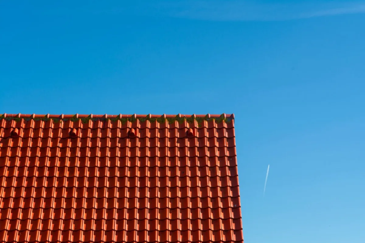 Tile roof gable in full sun, the kind of exposure that sets roof life in Council Bluffs, IA